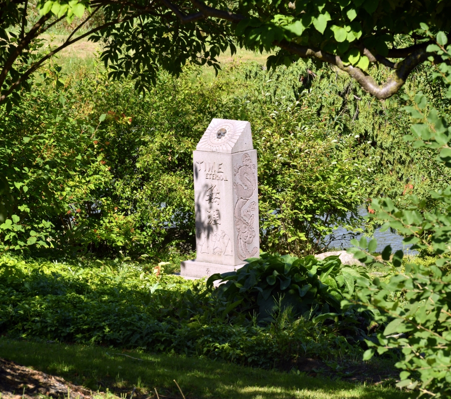 sundial at beechwood surrounded by trees