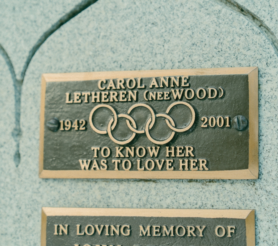 engraved plaque with Olympic rings
