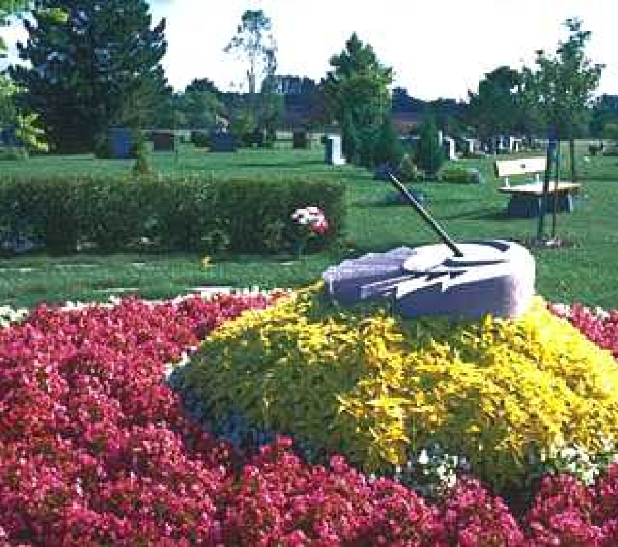sundial at elgin mills with lots of flowers