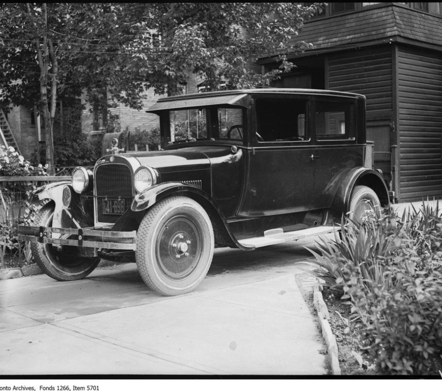 very old car in black and white