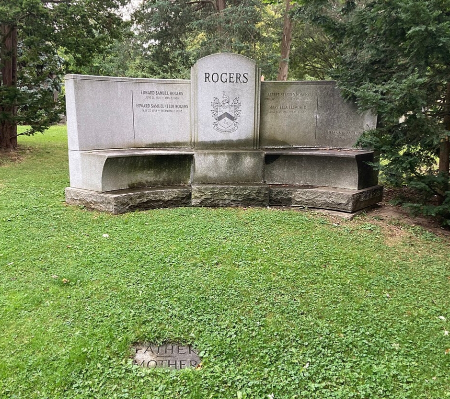 big grave that says Rogers