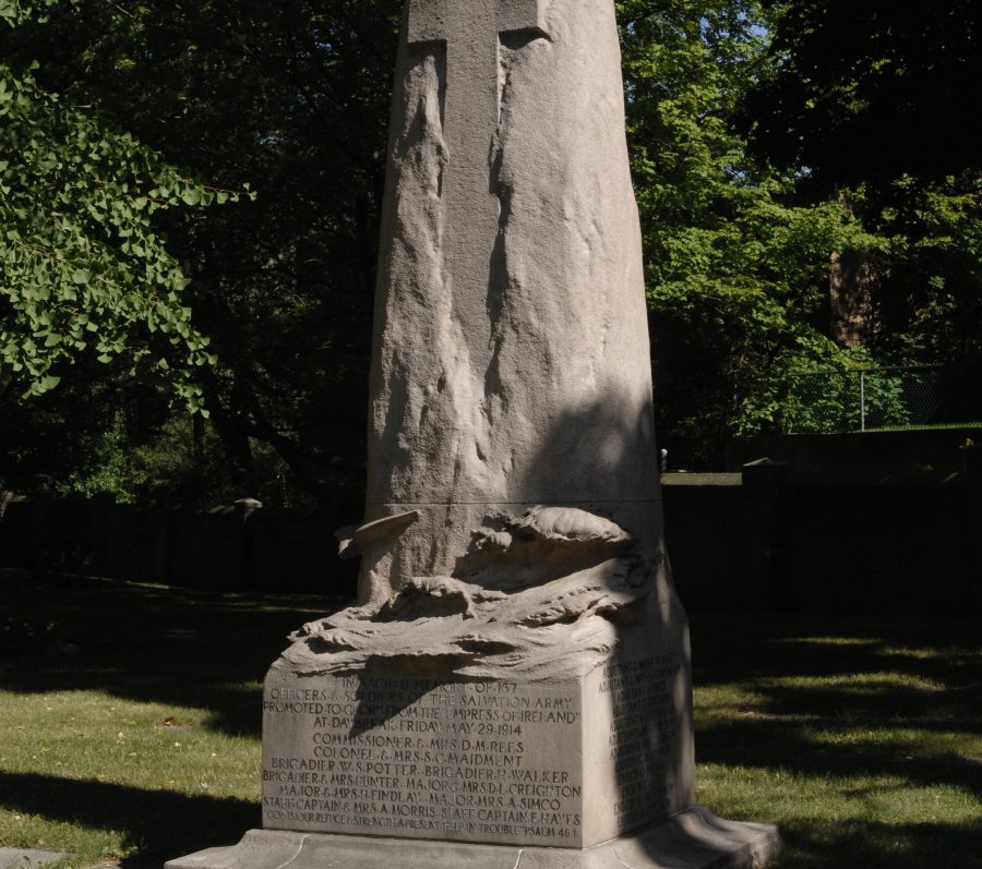 big granite monument with a cross