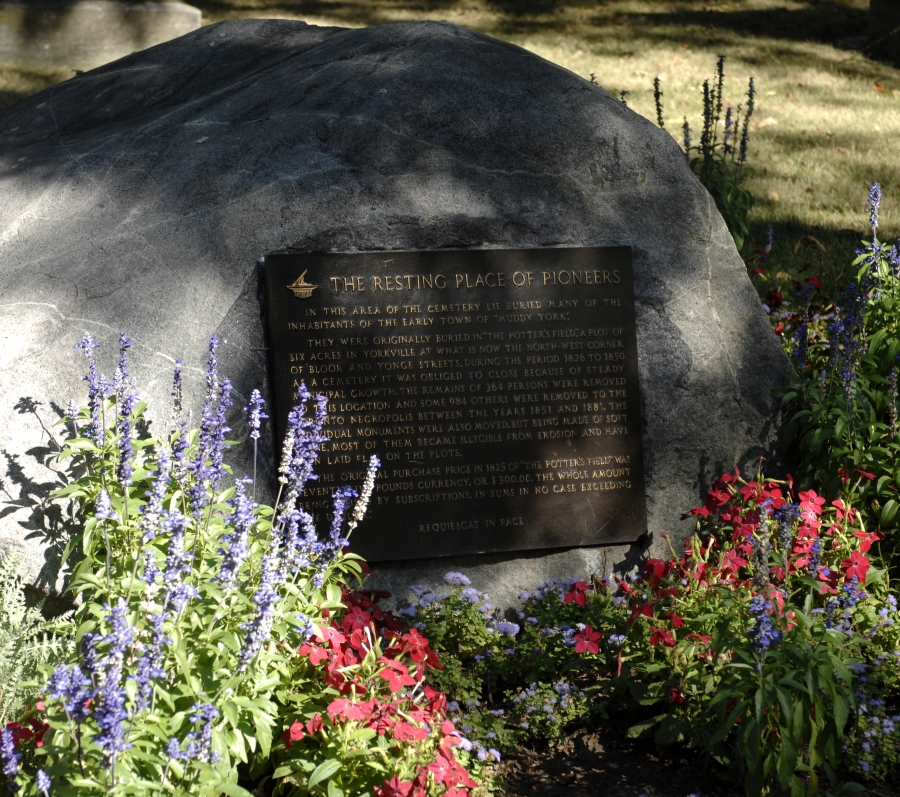 large boulder with a plaque