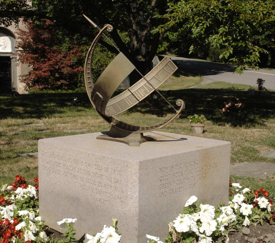 sundial at mount pleasant with flowers at the base