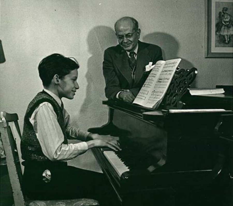 young boy at a piano