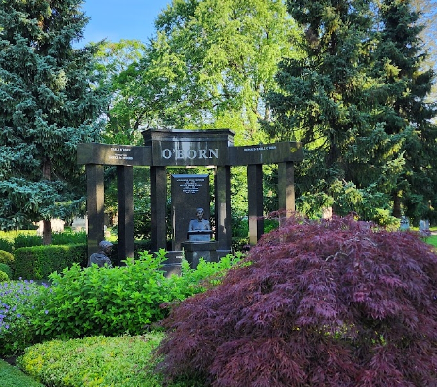 big monument surrounded by trees