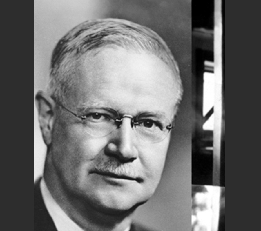 man in suit with glasses