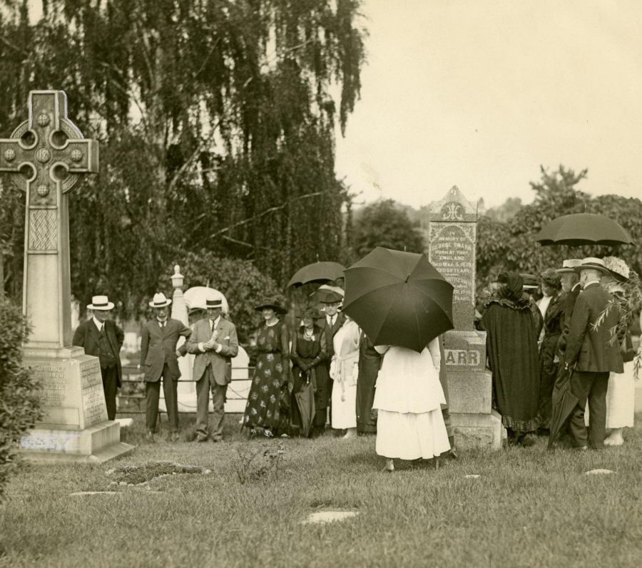 people with umbrellas in black and white