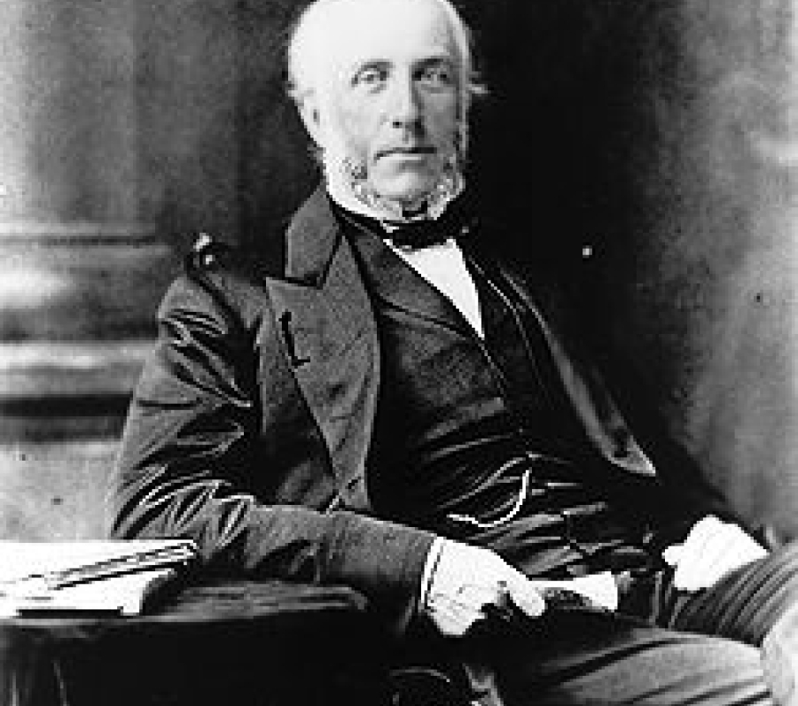 very old photo of a man in a suit