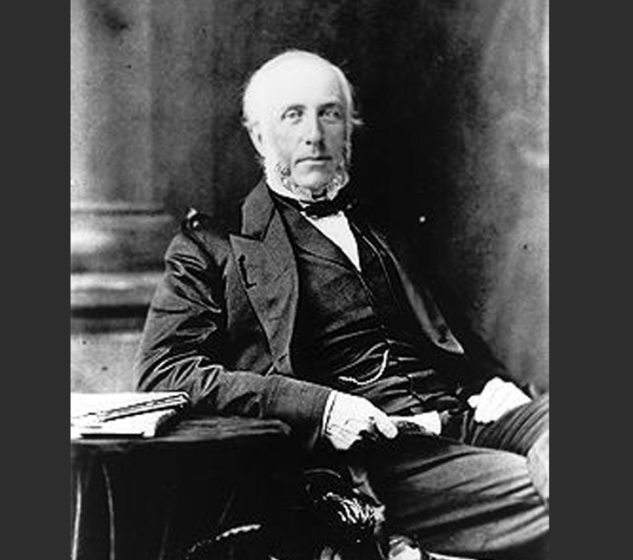 very old photo of a man in a suit