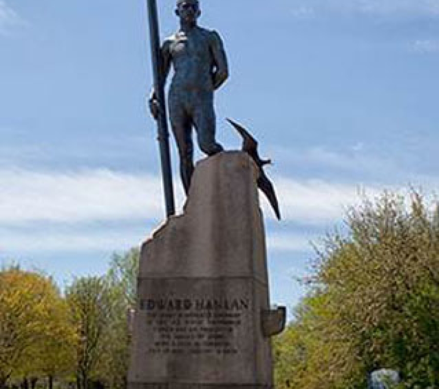 statue of man with an oar