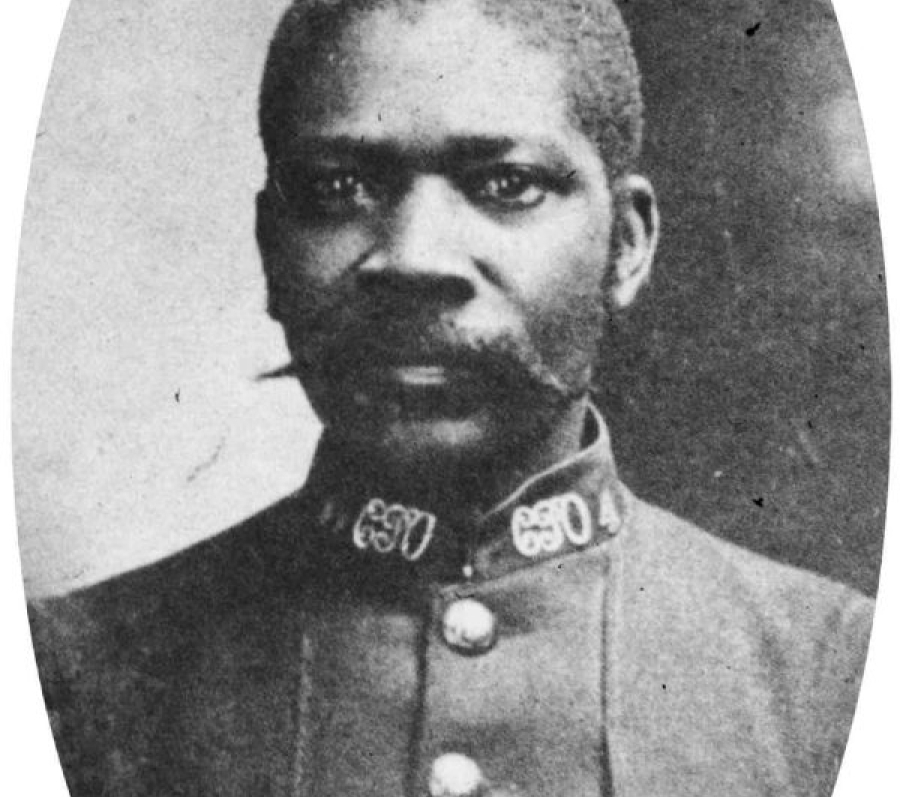 black man with a long mustache