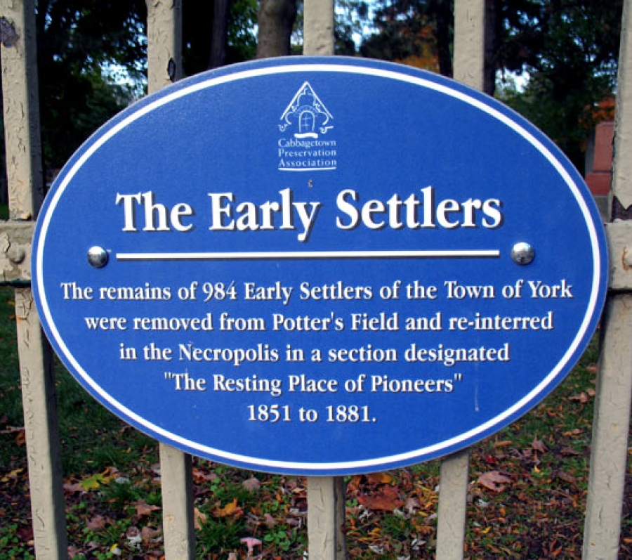a plaque on a gate