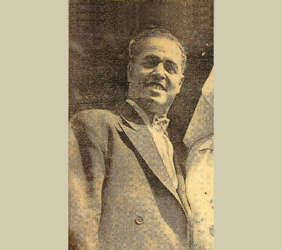 news clipping of a man in a suit