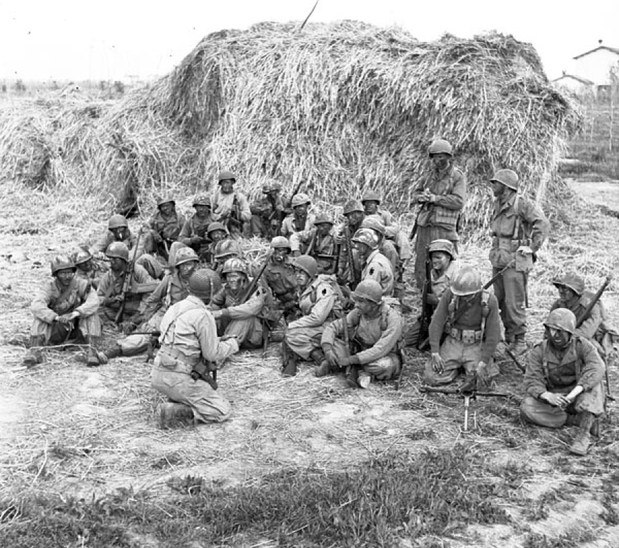 a group of men in combat