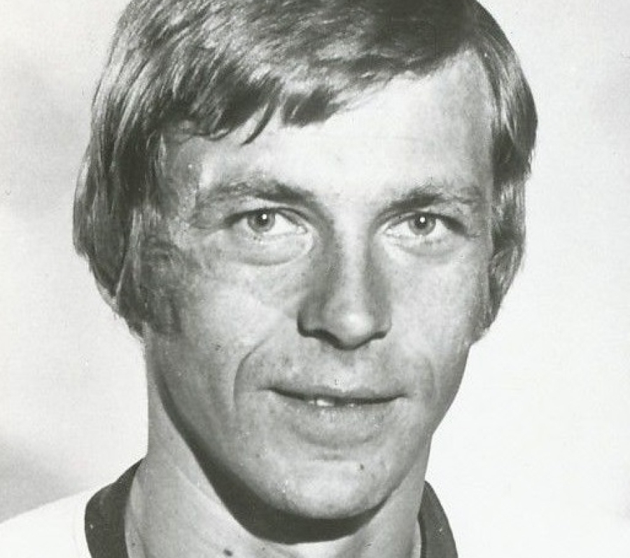 black and white headshot of a hockey player