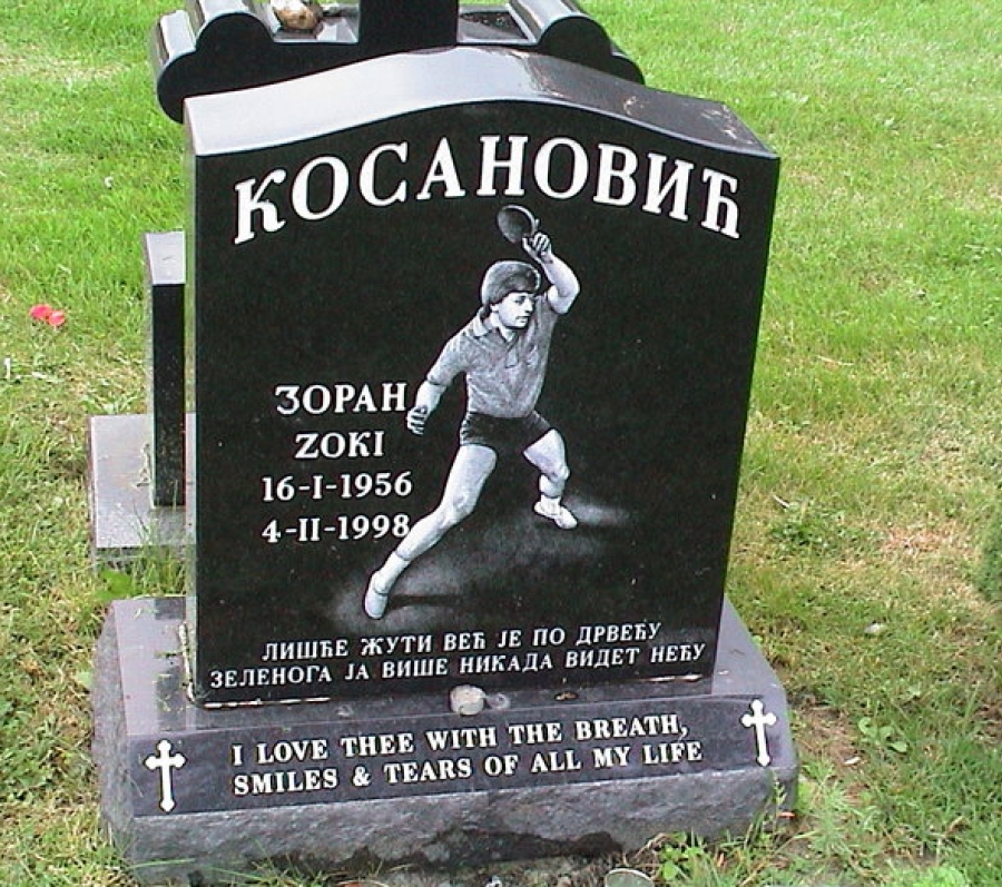 gravestone with a table tennis player on it