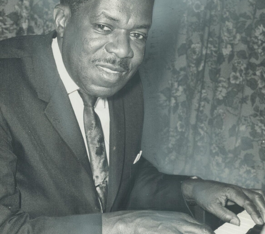 black man at the piano