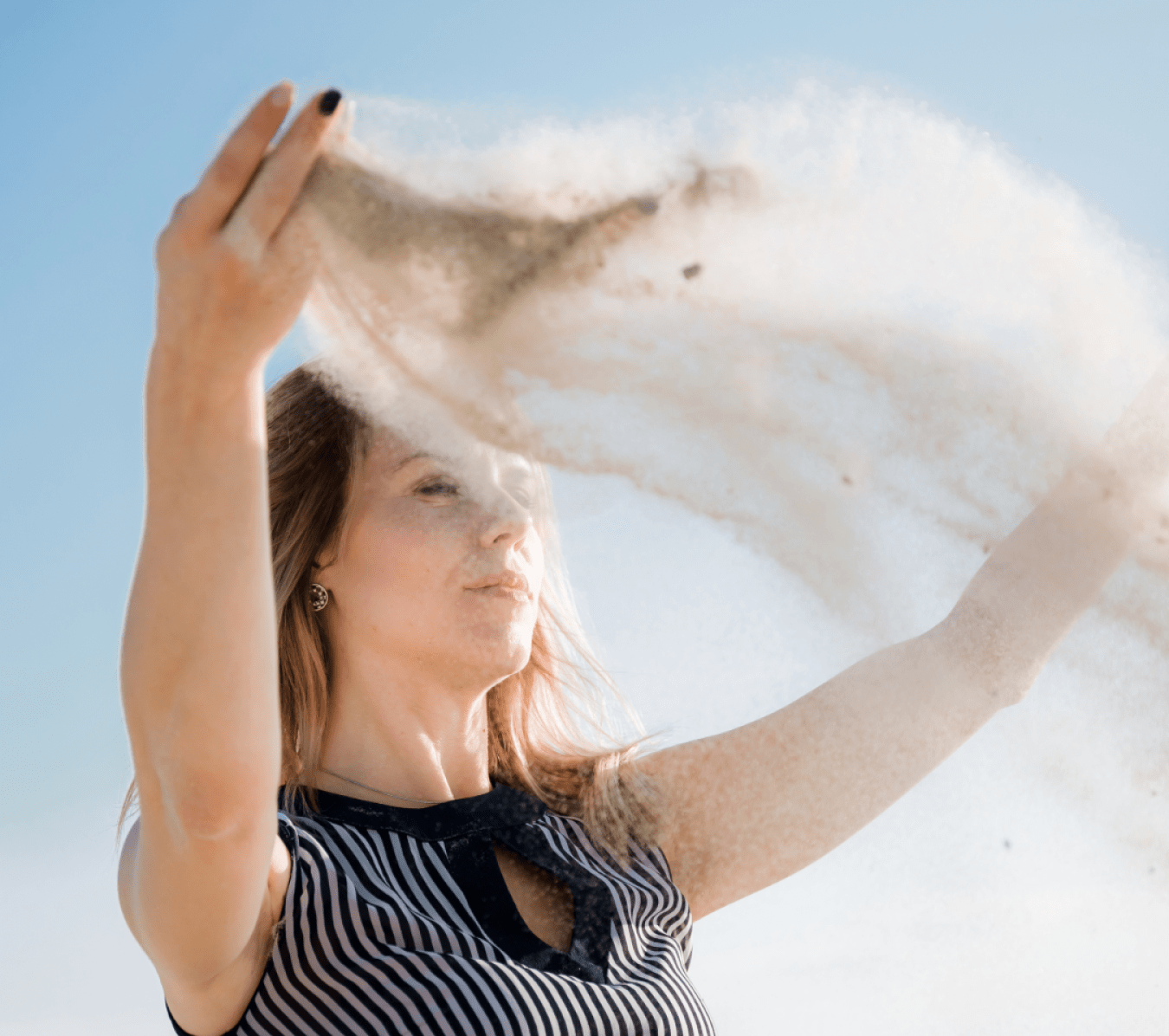 woman scattering ashes