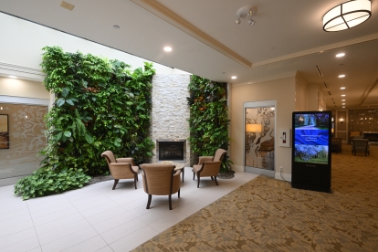lobby with living wall, screens and chairs