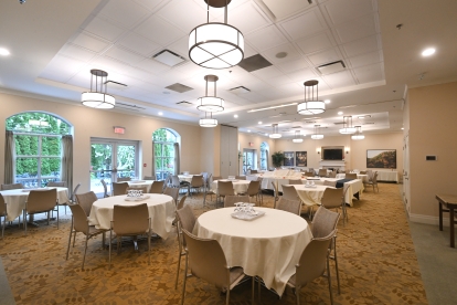 reception room with round tables and big windows