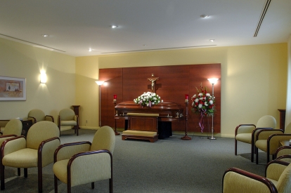 funeral service room at TSA Mississauga with coffin and chairs