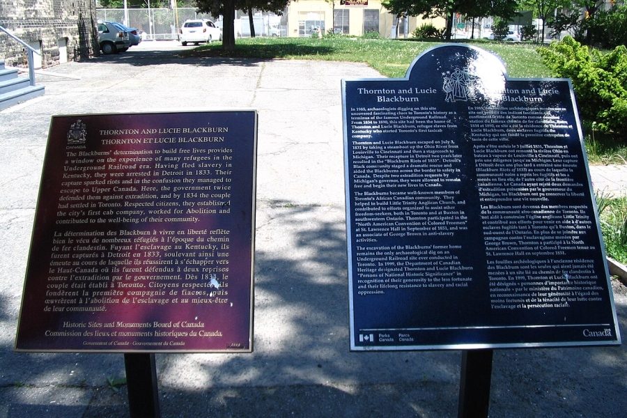 two plaques with text
