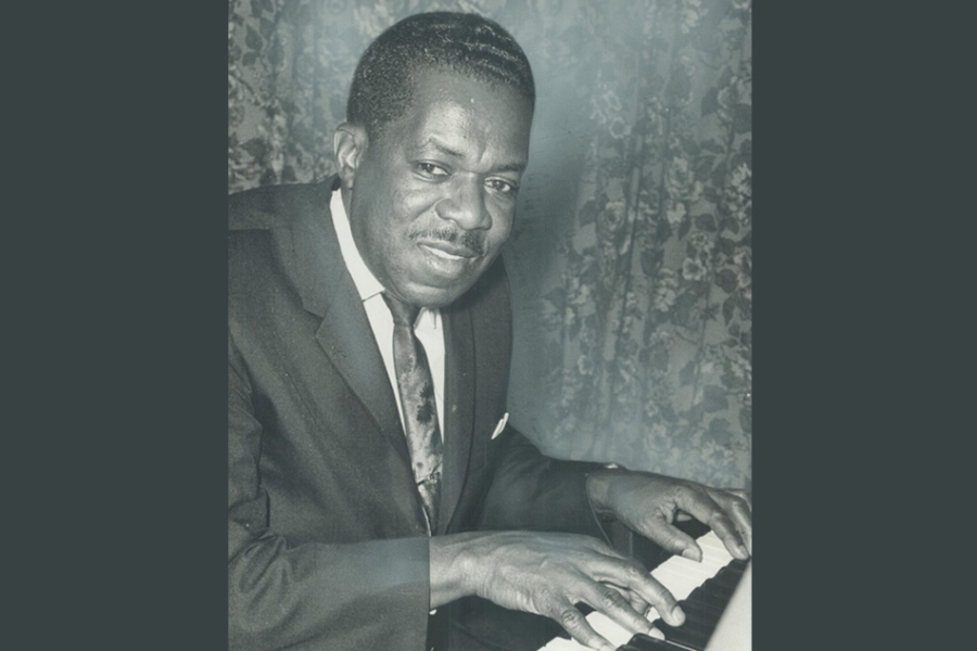 black man at the piano