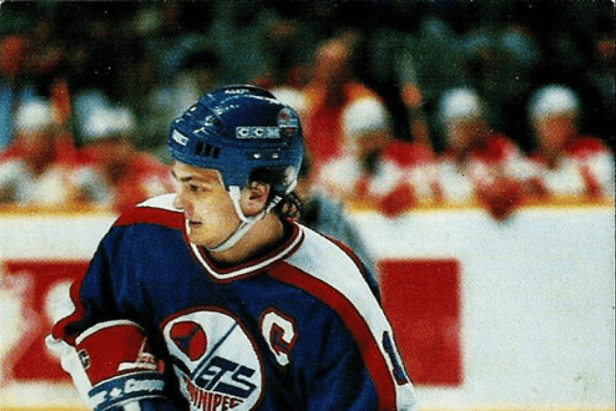 hockey player in blue uniform