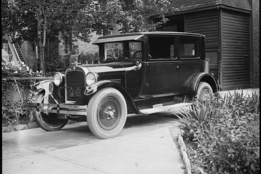 very old car in black and white