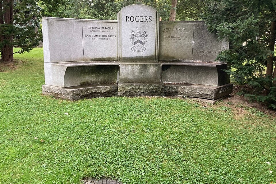 big grave that says Rogers