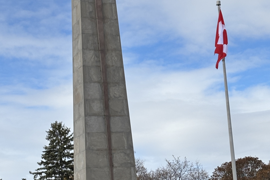 York Cenotaph with a Canadian flag