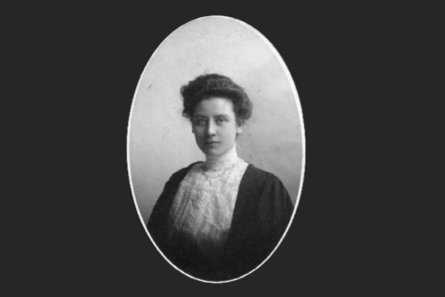 A vintage black‑and‑white portrait of Jennie Smilie Robertson shown from the waist up, wearing a high‑collared lace blouse and a dark jacket, framed within an oval border against a plain background.