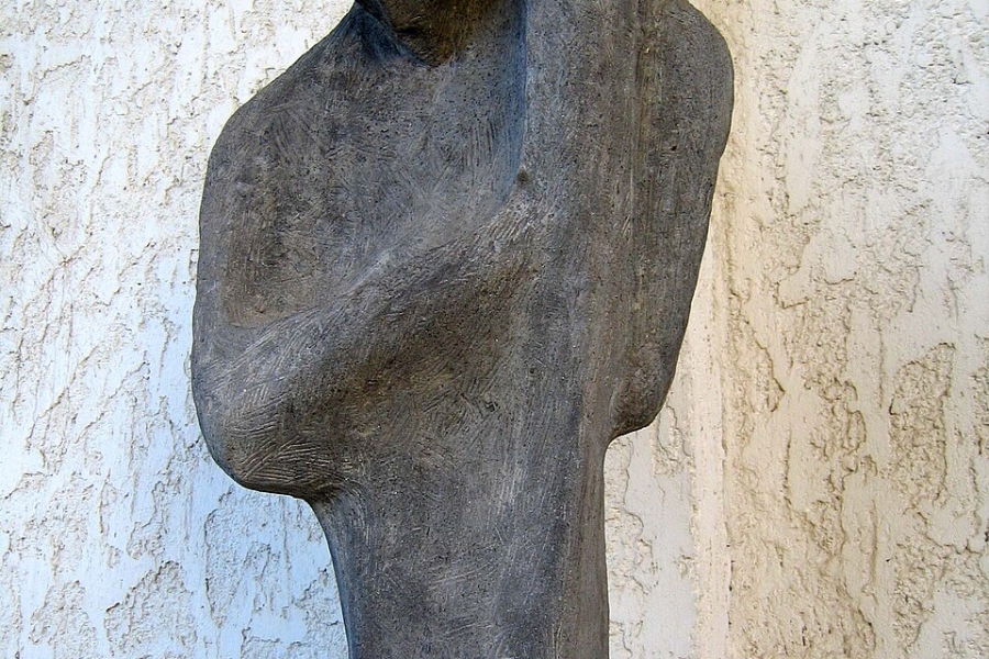 figure of man holding a child