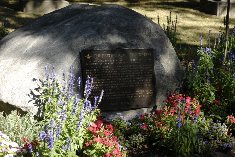 large boulder with a plaque