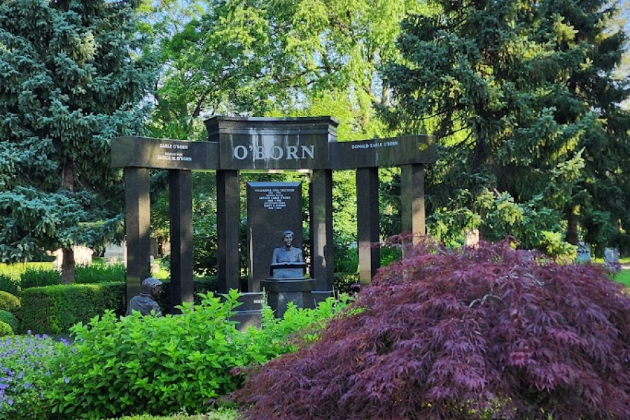 big monument surrounded by trees