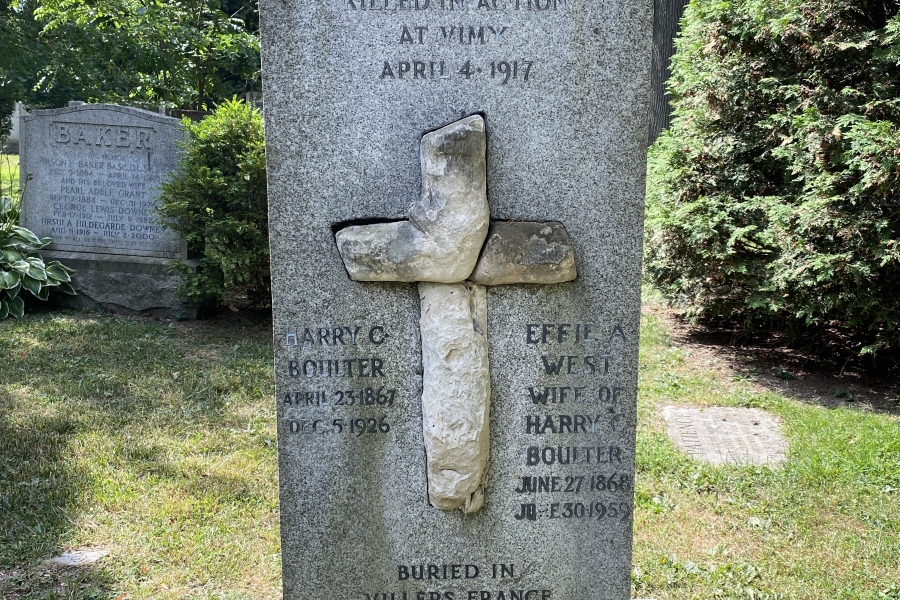 stone and granite monument with a cross
