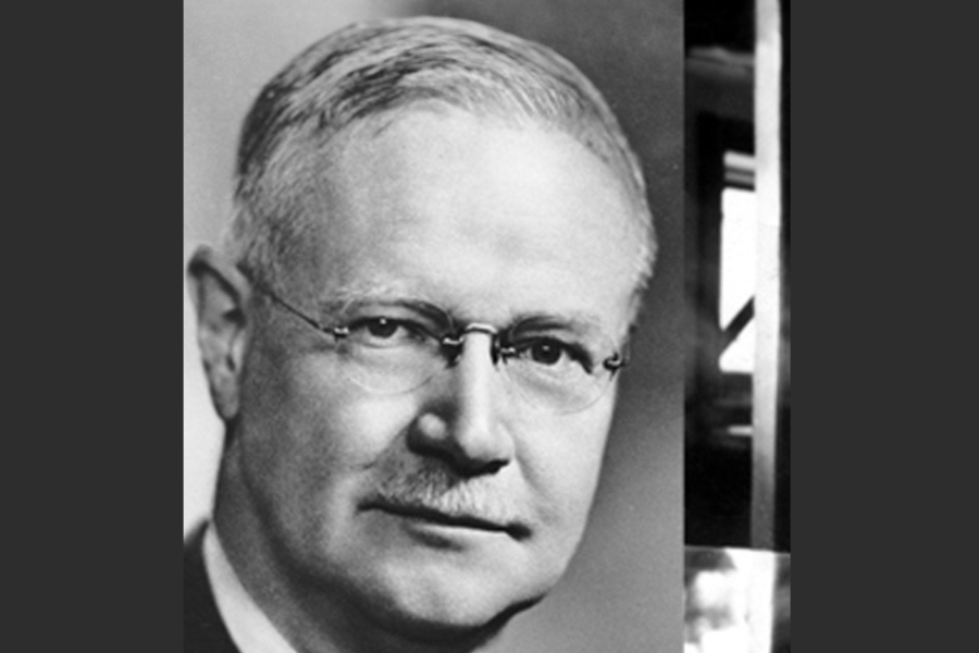 man in suit with glasses