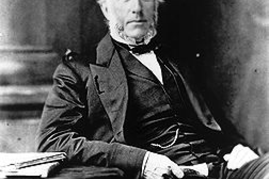 very old photo of a man in a suit