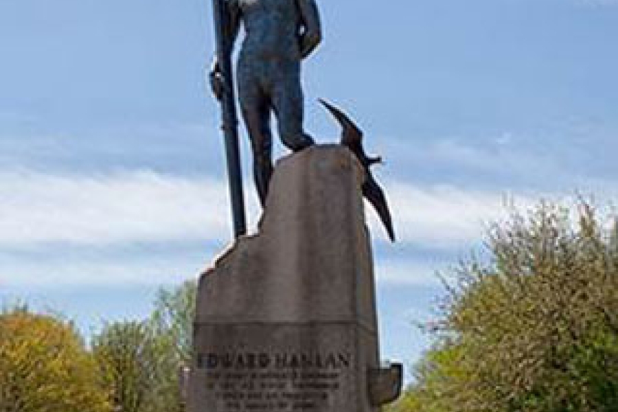 statue of man with an oar