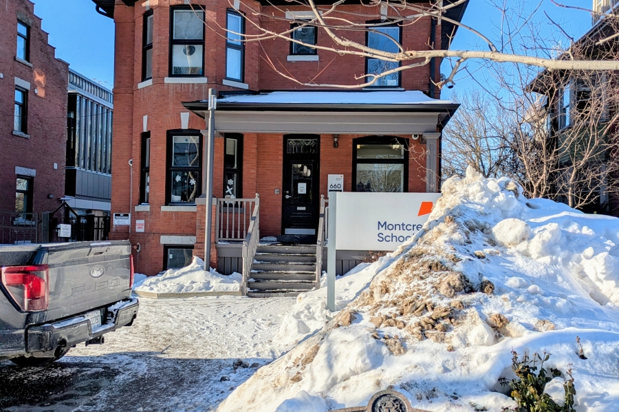 a big house with blue sky and snow