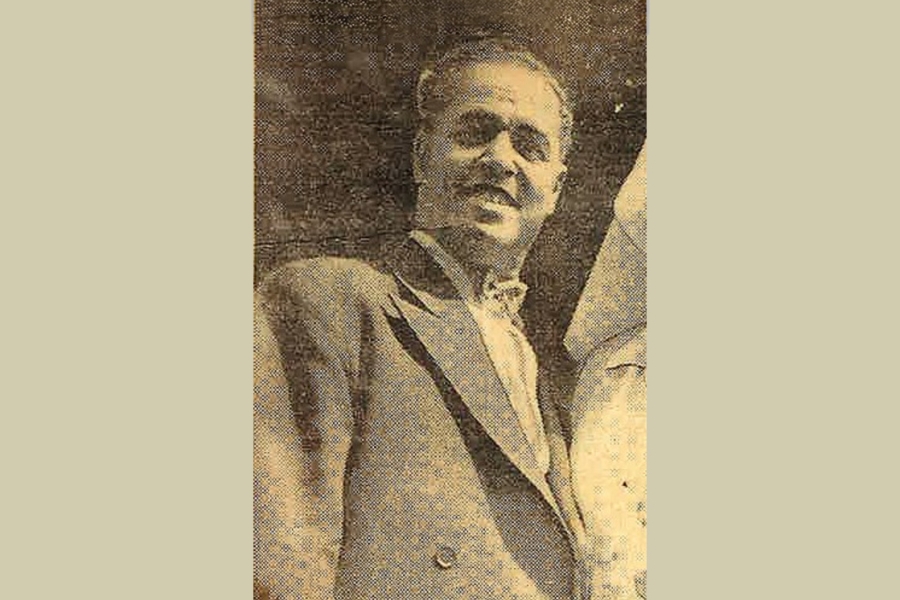 news clipping of a man in a suit
