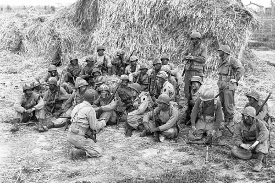 a group of men in combat