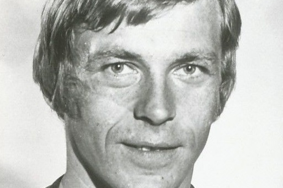 black and white headshot of a hockey player