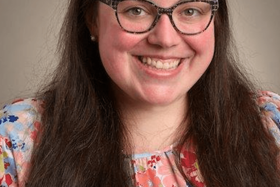 smiling woman with glasses